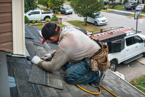 Professional Roof Replacement technician working in Cliffside Park, NJ